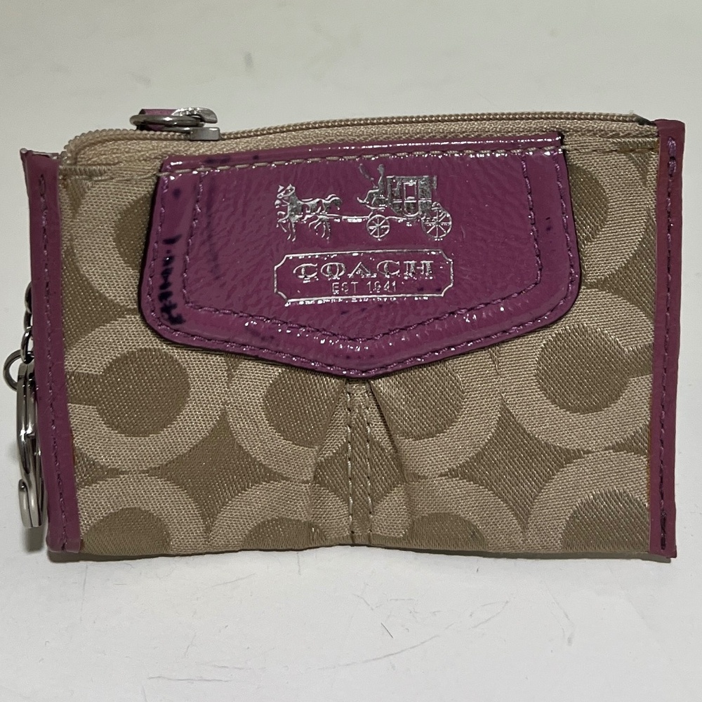 Signature coach coin purse with patent leather detail